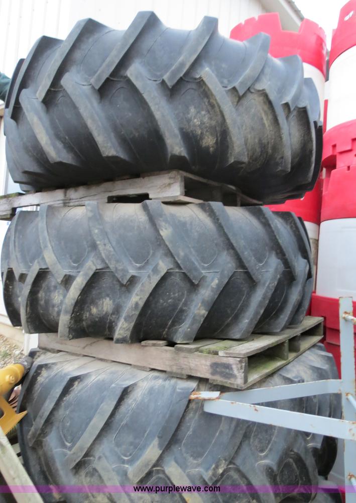 image for item G9511 (4) Titan 23.1R30 tires and wheels