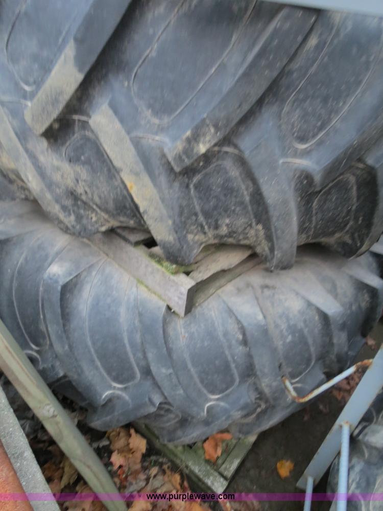 image for item G9511 (4) Titan 23.1R30 tires and wheels