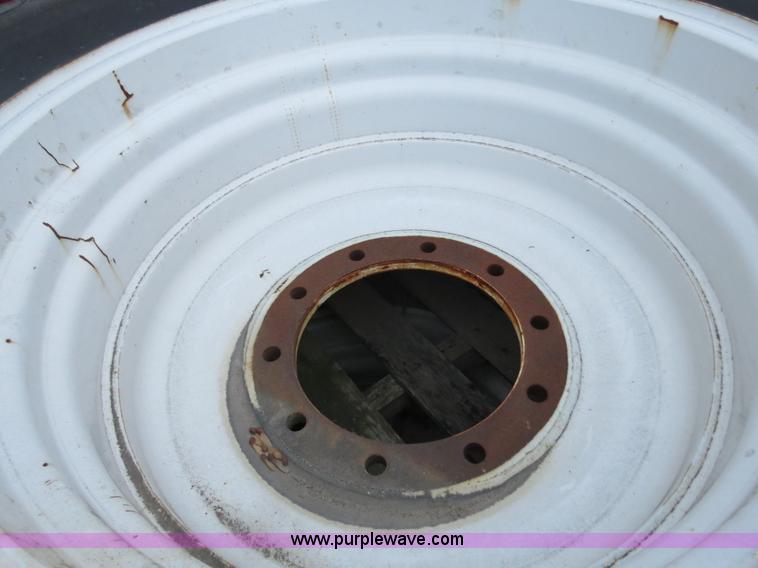 image for item G9511 (4) Titan 23.1R30 tires and wheels