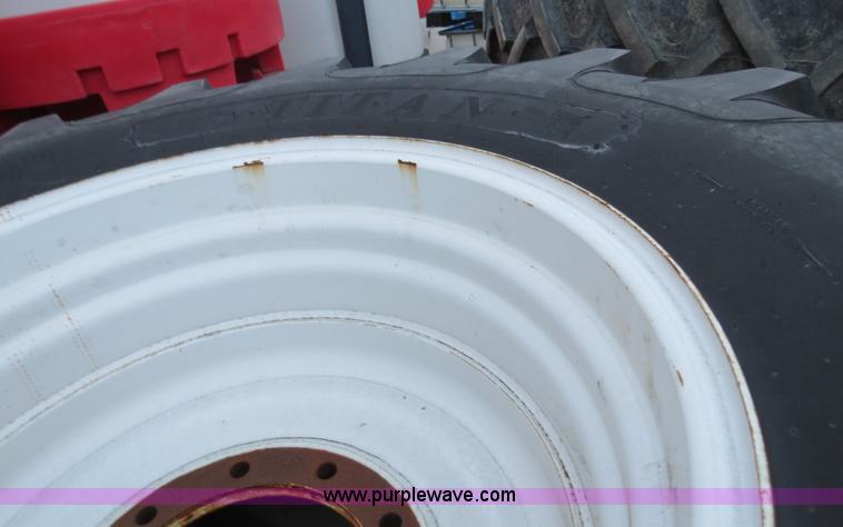 image for item G9511 (4) Titan 23.1R30 tires and wheels