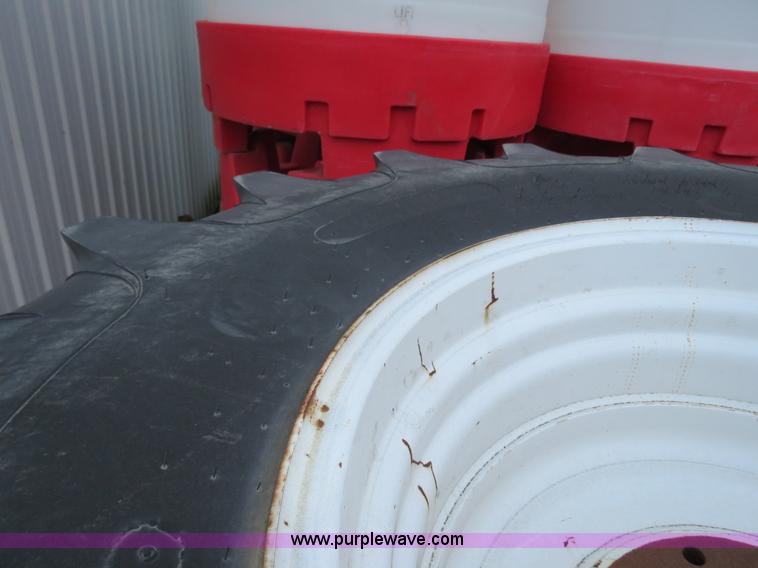 image for item G9511 (4) Titan 23.1R30 tires and wheels