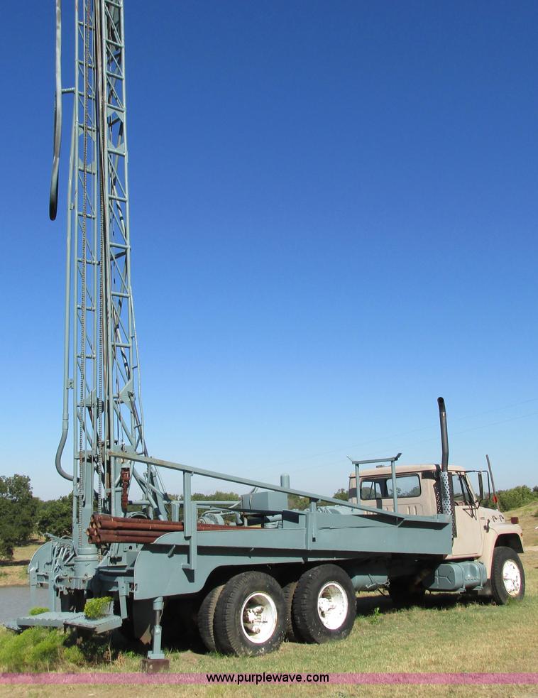 image for item I4981 1980 International F1954 truck with Mayhew drill rig