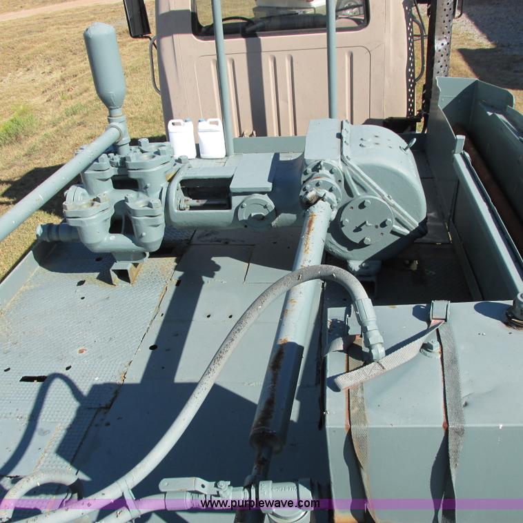 image for item I4981 1980 International F1954 truck with Mayhew drill rig