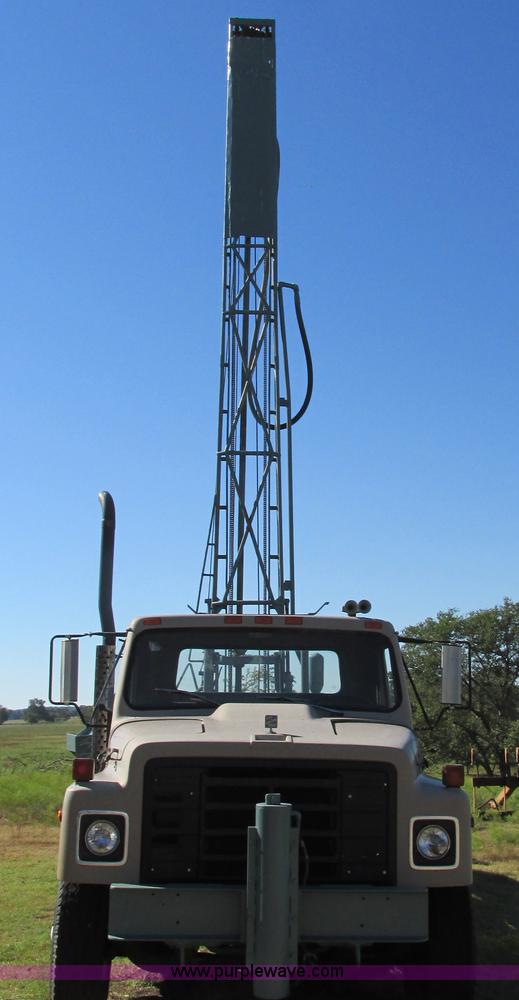 image for item I4981 1980 International F1954 truck with Mayhew drill rig