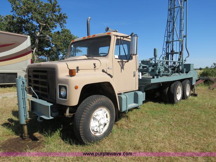 image for item I4981 1980 International F1954 truck with Mayhew drill rig