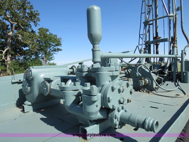 image for item I4981 1980 International F1954 truck with Mayhew drill rig