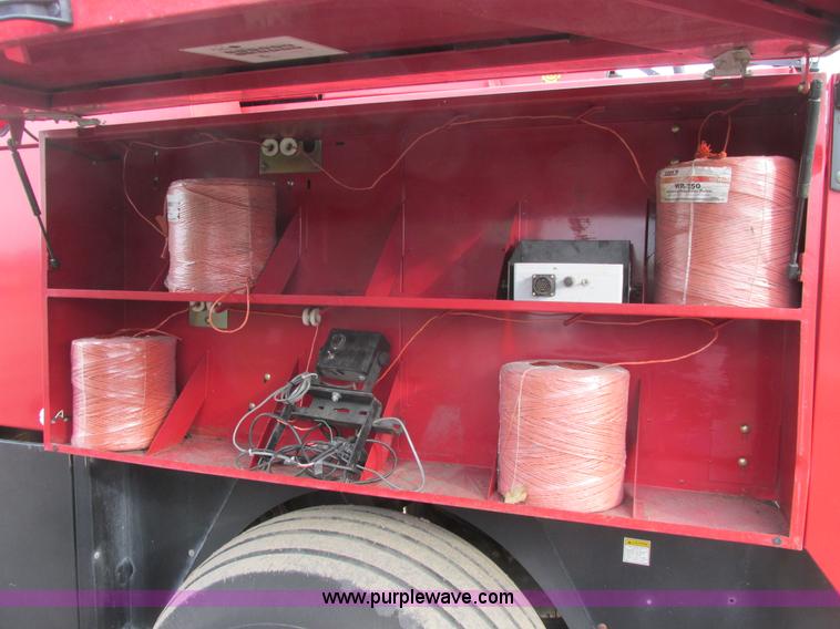 image for item A8653 1998 New Holland 590 square baler