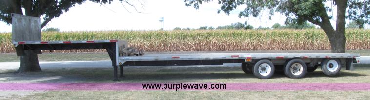 image for item E4638 2012 shop built triple axle step deck equipment trailer