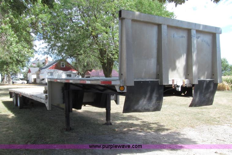 image for item E4638 2012 shop built triple axle step deck equipment trailer