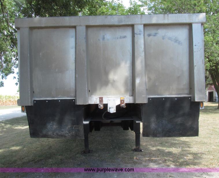 image for item E4638 2012 shop built triple axle step deck equipment trailer