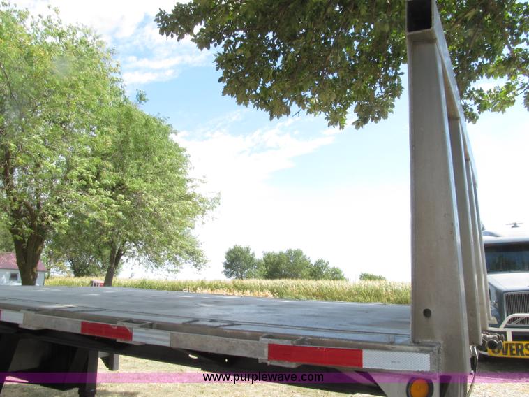 image for item E4638 2012 shop built triple axle step deck equipment trailer