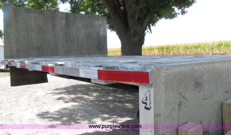 image for item E4638 2012 shop built triple axle step deck equipment trailer