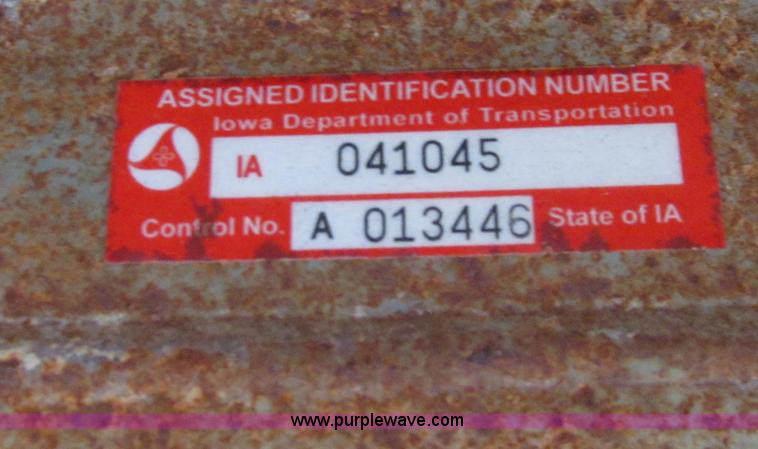 image for item E4638 2012 shop built triple axle step deck equipment trailer