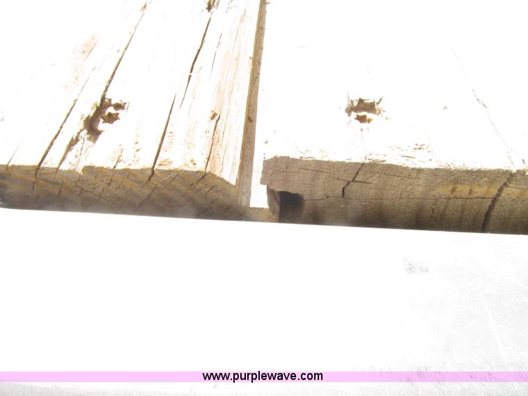 image for item E4638 2012 shop built triple axle step deck equipment trailer