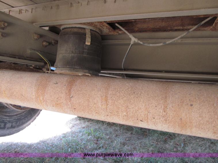 image for item E4638 2012 shop built triple axle step deck equipment trailer