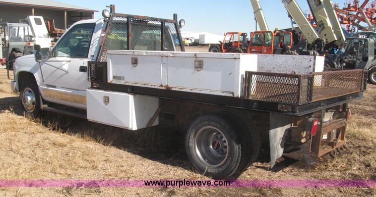 image for item F7189 1997 GMC Sierra 3500 SL flatbed truck