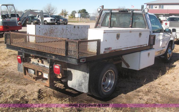 image for item F7189 1997 GMC Sierra 3500 SL flatbed truck