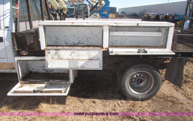 image for item F7189 1997 GMC Sierra 3500 SL flatbed truck