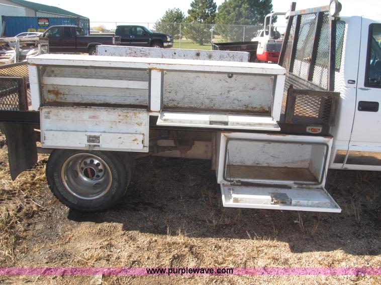 image for item F7189 1997 GMC Sierra 3500 SL flatbed truck