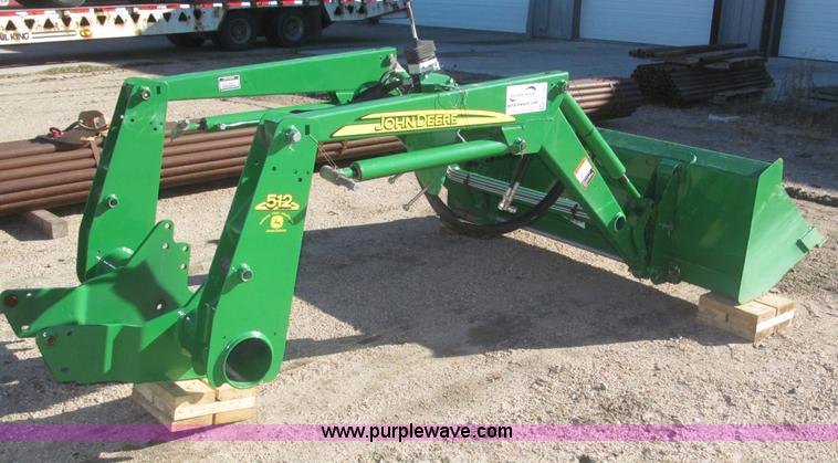 image for item F7190 2006 John Deere 512 loader attachment
