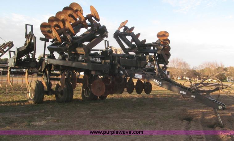 image for item F7202 2007 M&W Earthmaster 22' disk ripper