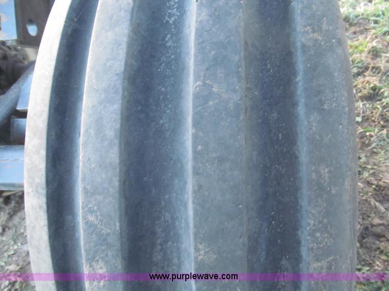 image for item F7202 2007 M&W Earthmaster 22' disk ripper