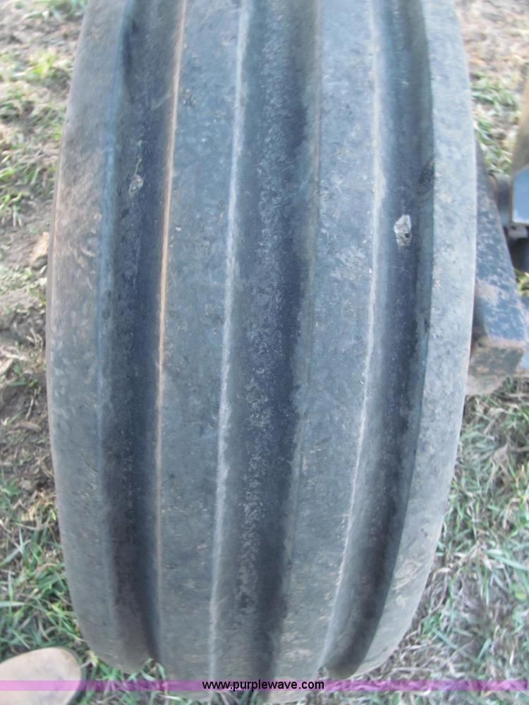 image for item F7202 2007 M&W Earthmaster 22' disk ripper