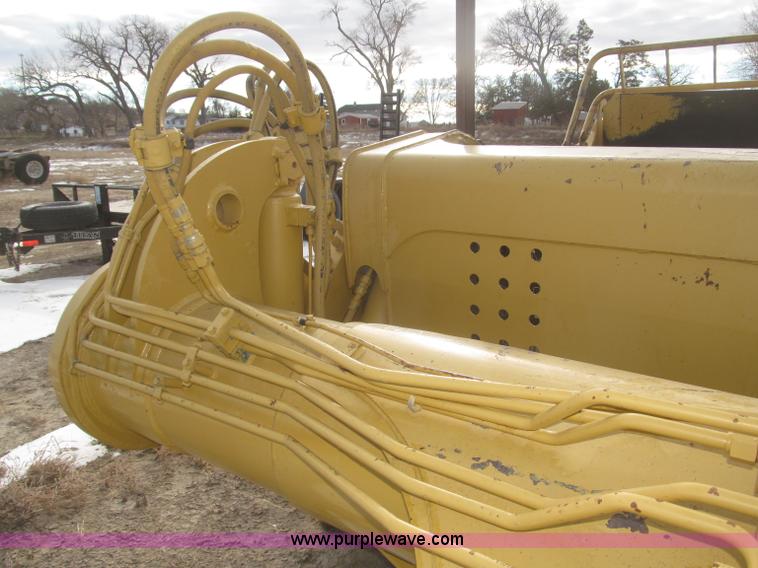 image for item F7204 2003 Noble 417 forced ejection scraper