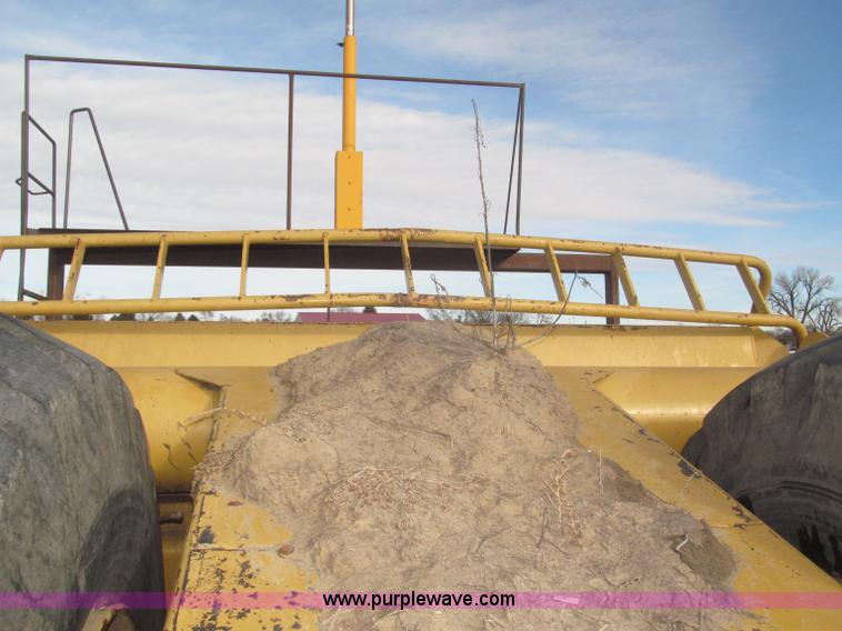 image for item F7204 2003 Noble 417 forced ejection scraper