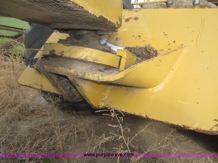 image for item F7204 2003 Noble 417 forced ejection scraper