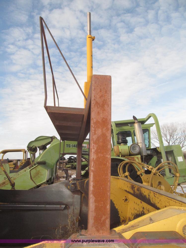 image for item F7204 2003 Noble 417 forced ejection scraper