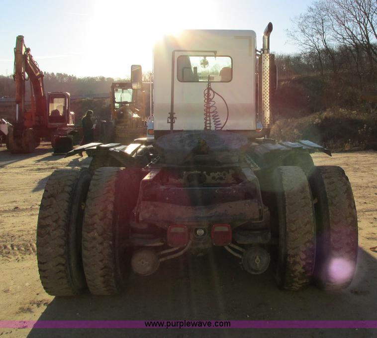 image for item I4214 1996 Kenworth T600 tri axle semi truck