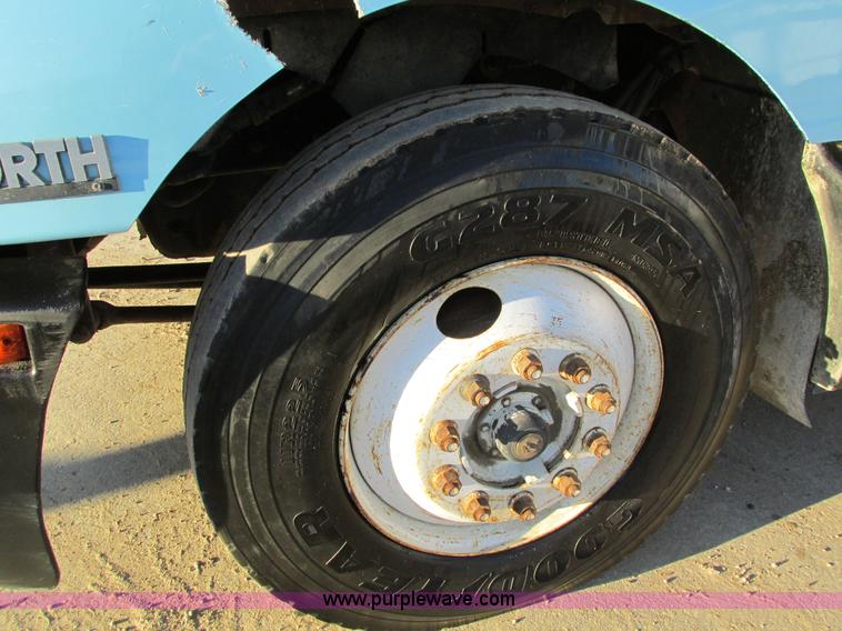 image for item I4214 1996 Kenworth T600 tri axle semi truck