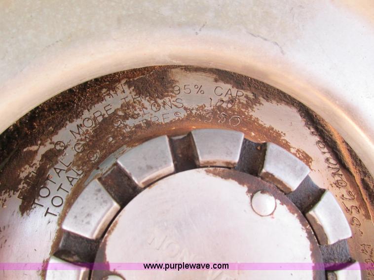 image for item I4214 1996 Kenworth T600 tri axle semi truck