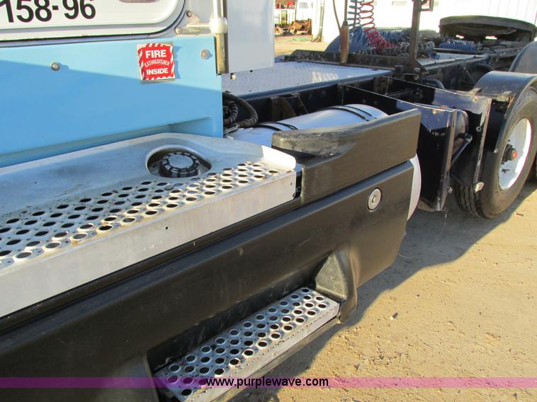 image for item I4214 1996 Kenworth T600 tri axle semi truck