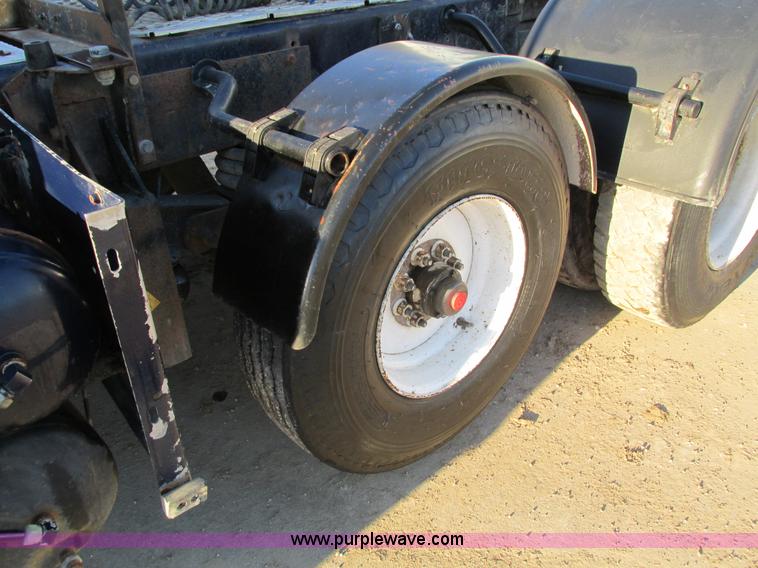 image for item I4214 1996 Kenworth T600 tri axle semi truck