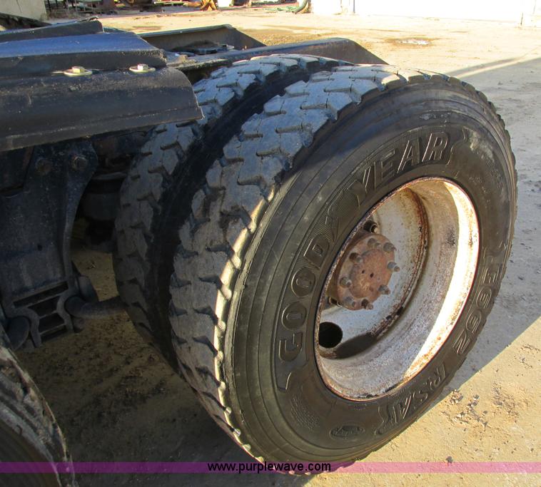 image for item I4214 1996 Kenworth T600 tri axle semi truck