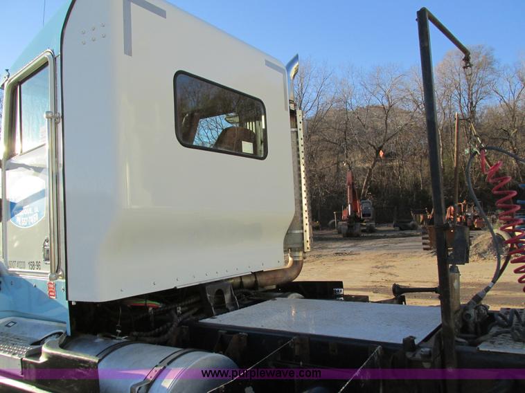 image for item I4214 1996 Kenworth T600 tri axle semi truck