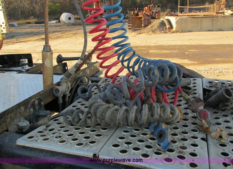 image for item I4214 1996 Kenworth T600 tri axle semi truck