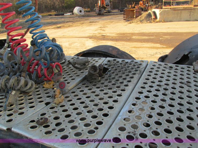 image for item I4214 1996 Kenworth T600 tri axle semi truck