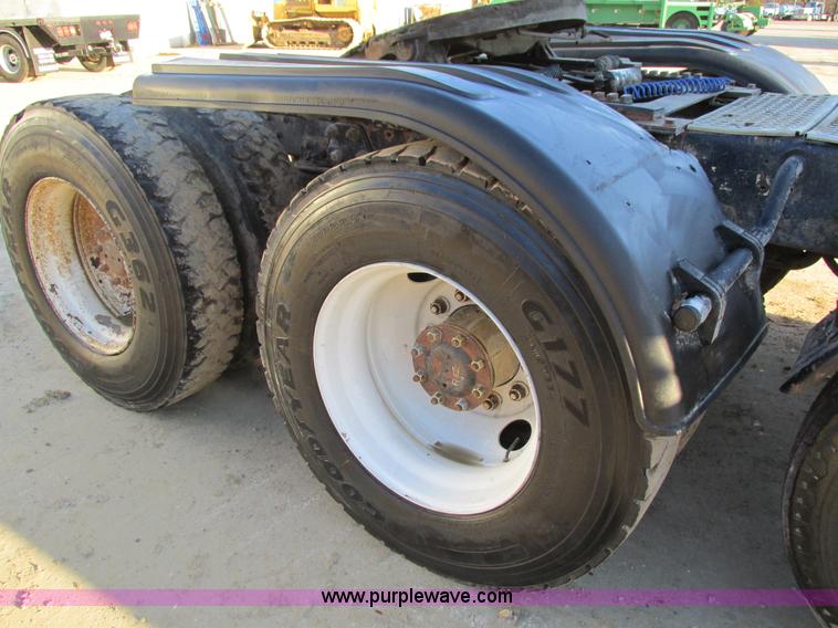 image for item I4214 1996 Kenworth T600 tri axle semi truck