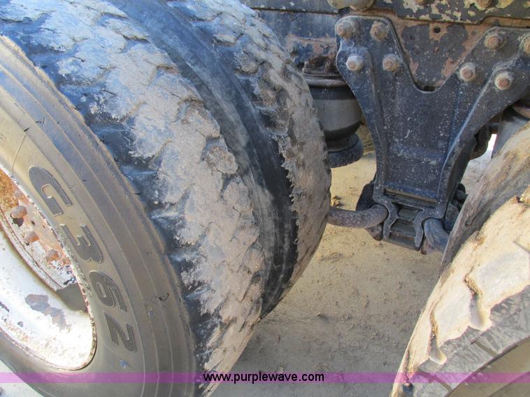 image for item I4214 1996 Kenworth T600 tri axle semi truck