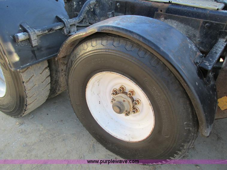 image for item I4214 1996 Kenworth T600 tri axle semi truck