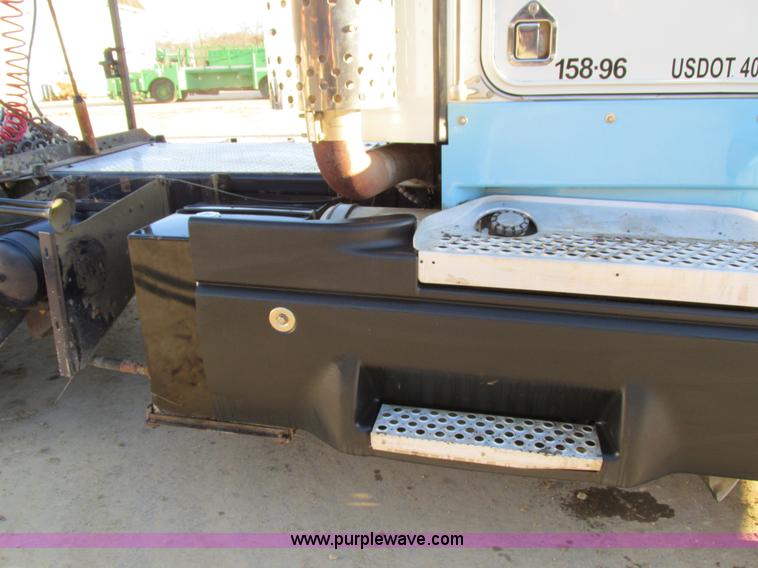 image for item I4214 1996 Kenworth T600 tri axle semi truck