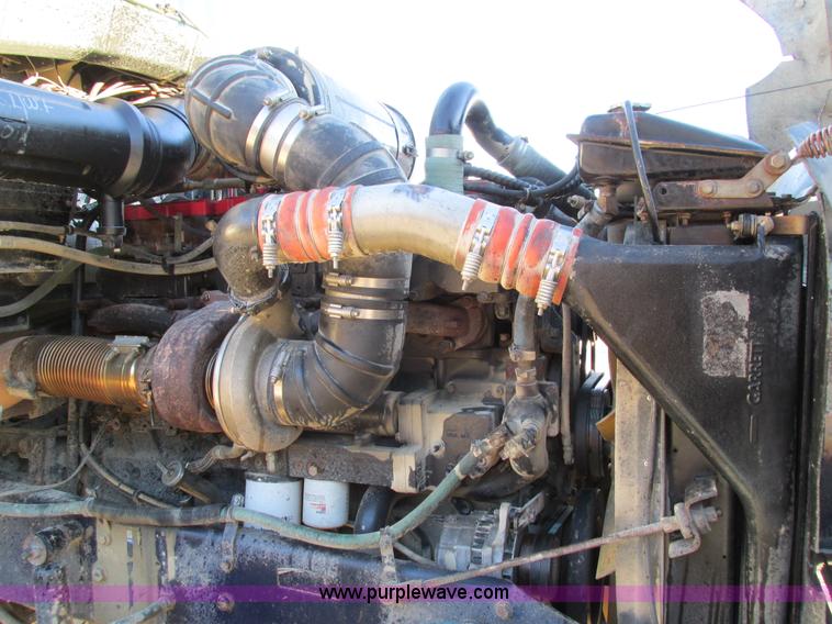 image for item I4214 1996 Kenworth T600 tri axle semi truck