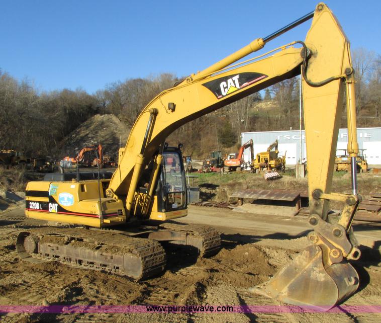 image for item I4216 1997 Caterpillar 320BL excavator