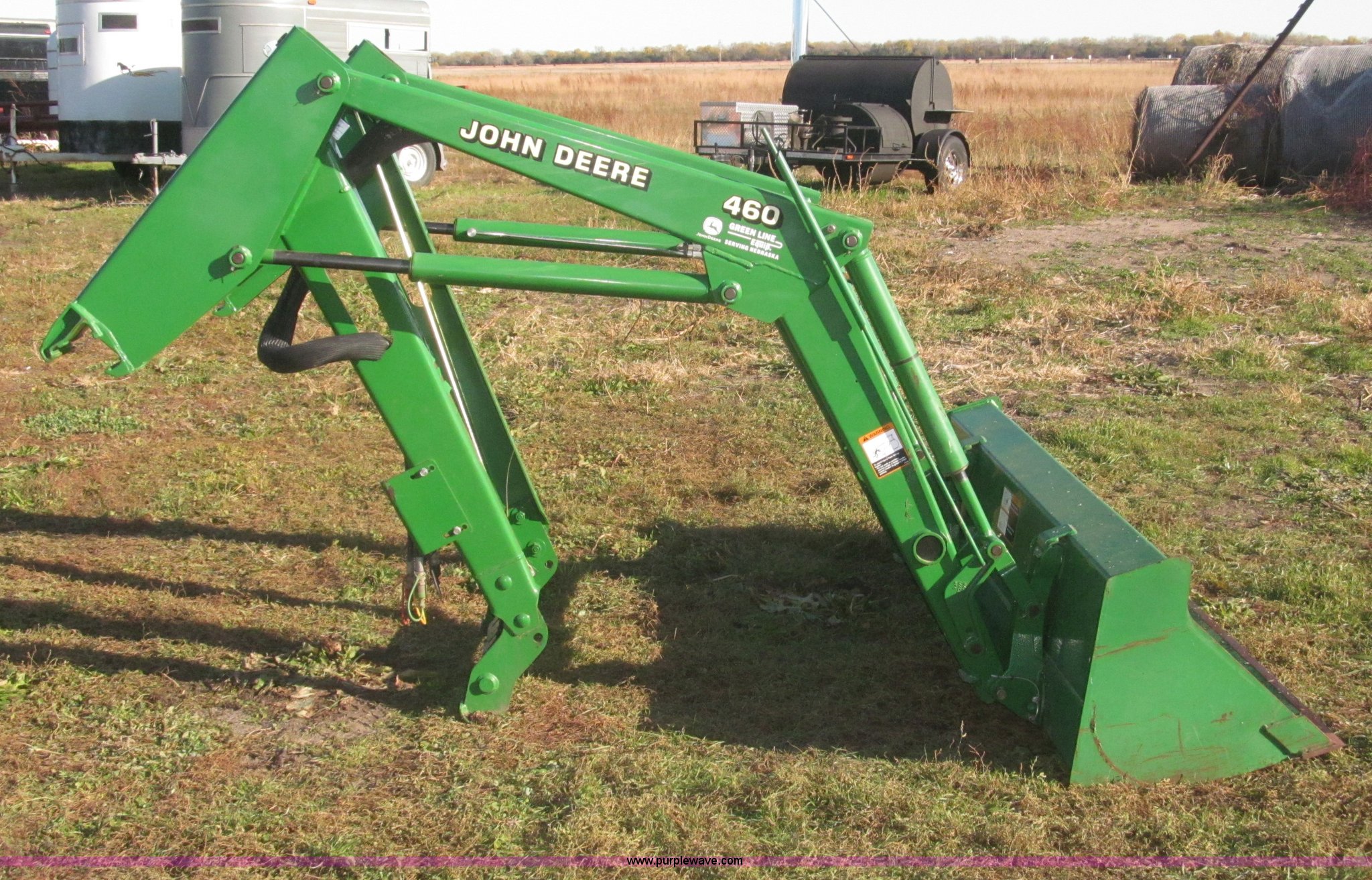 John Deere 460 loader attachment in Grand Island, NE Item F7191 sold Purple Wave