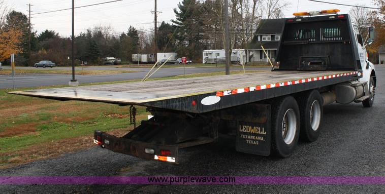 image for item C1653 2005 Sterling LT9500 rollback truck