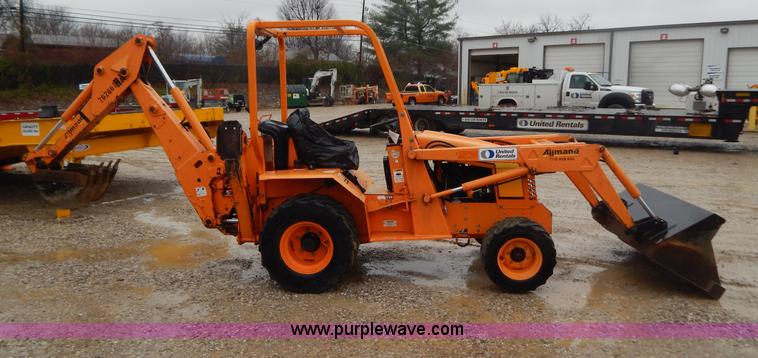 image for item H3913 2007 Almand TLB425ESL compact backhoe