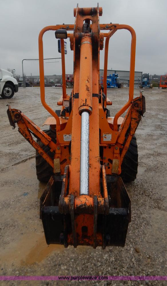 image for item H3913 2007 Almand TLB425ESL compact backhoe